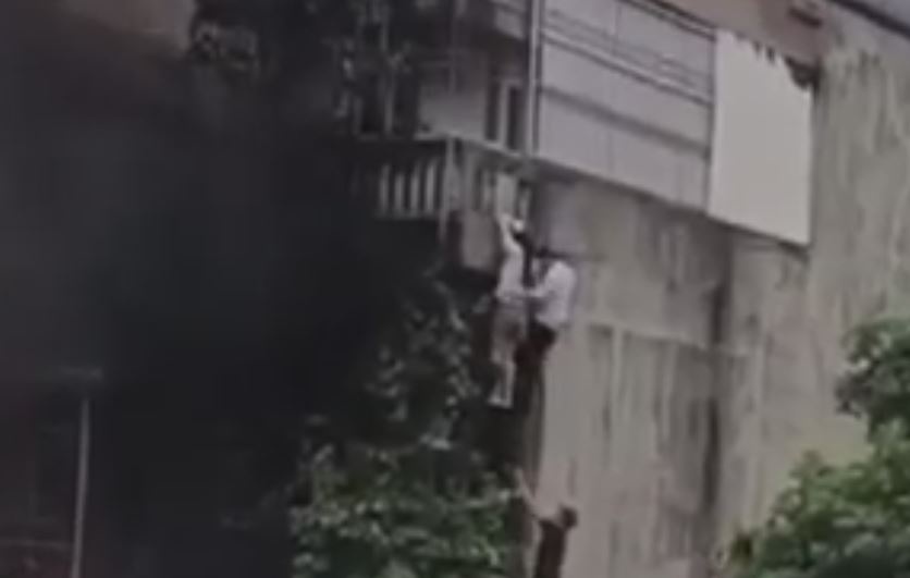 'Nguoi hung' giai cuu nan nhan vu chay nha tro 3 tang tai Ha Noi hinh anh