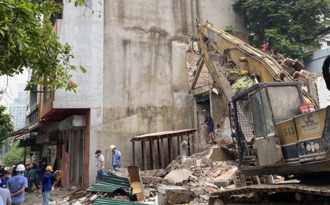 Giai phong mat bang xong hon 1 km duong ven ho Tay hinh anh