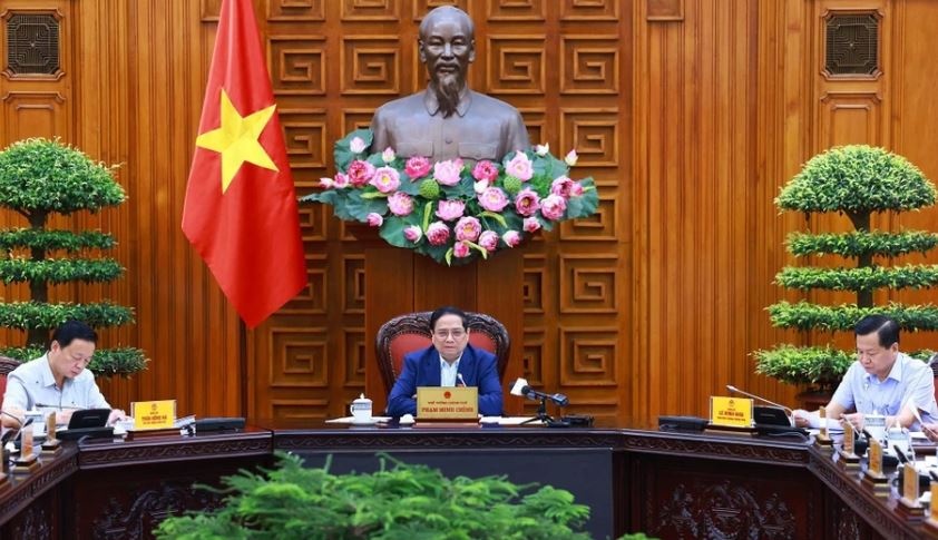 Thu tuong chu tri hop Thuong truc Chinh phu ve kiem soat lam phat hinh anh