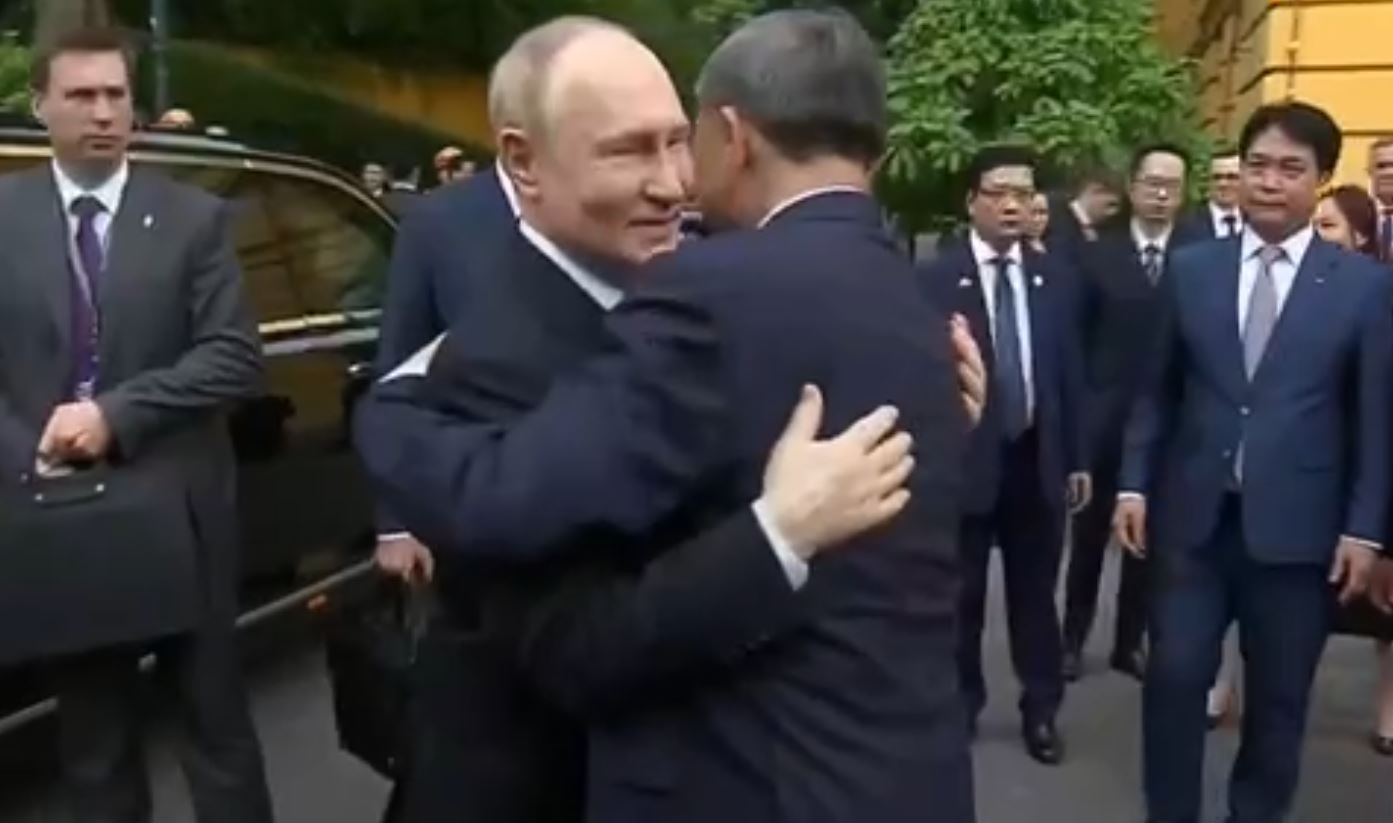 Chu tich nuoc To Lam don Tong thong Putin hinh anh