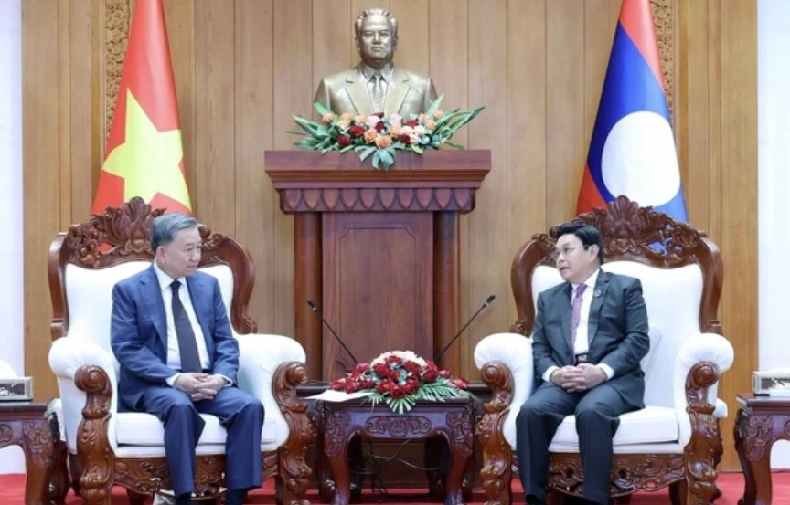 Chu tich nuoc To Lam hoi kien Chu tich Quoc hoi Lao hinh anh