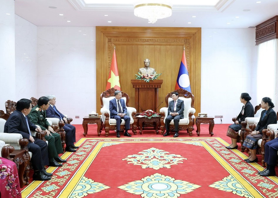 Chu tich nuoc: Viet Nam san sang ho tro Lao trong hoat dong doi ngoai hinh anh