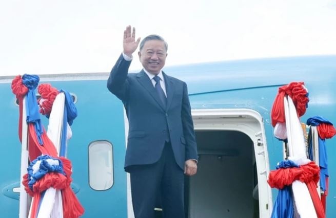 Chu tich nuoc To Lam ket thuc tot dep chuyen tham toi CHDCND Lao hinh anh