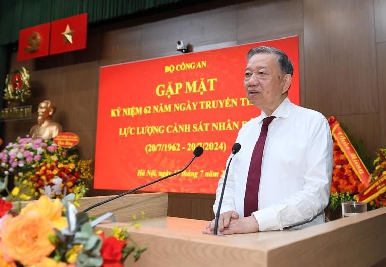 Chu tich nuoc du le ky niem 62 nam Ngay truyen thong luc luong CSND hinh anh