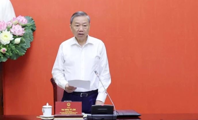 Chu tich nuoc To Lam chu tri phien hop Hoi dong Quoc phong va An ninh hinh anh