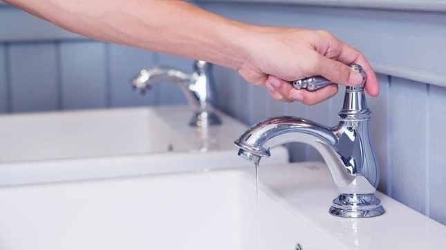 Mot nguoi o TP.HCM chuyen nham gan 500 trieu dong tien nuoc hinh anh