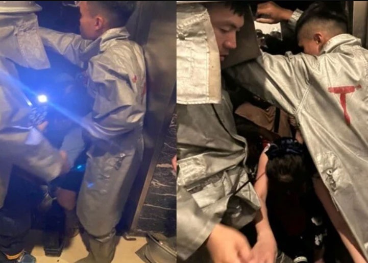 Canh sat giai cuu 9 nguoi mac ket trong thang may o Ha Noi hinh anh