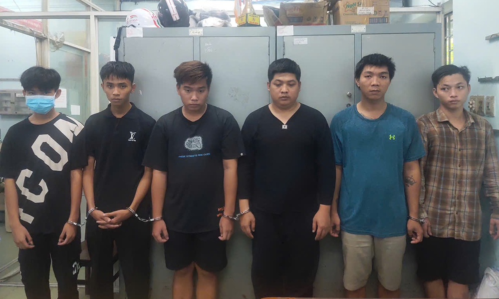 Bat nhom doi tuong tat son doi no thue o TP.HCM hinh anh