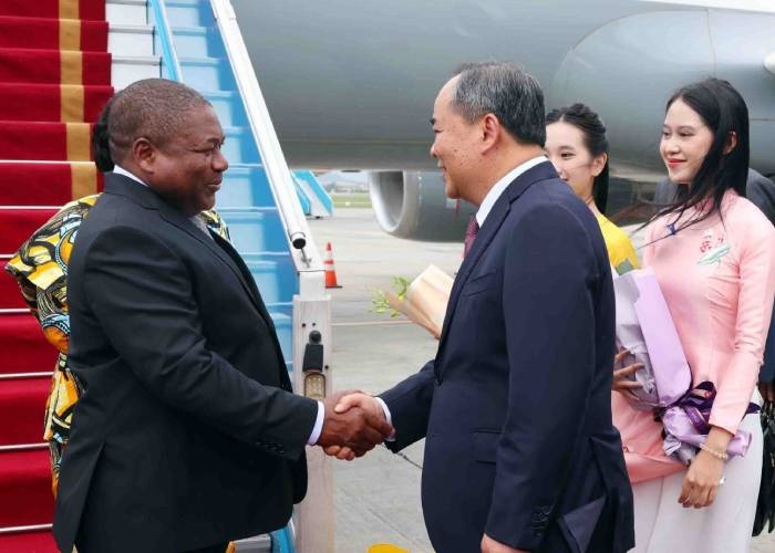 Tong thong CH Mozambique va phu nhan bat dau tham chinh thuc Viet Nam hinh anh