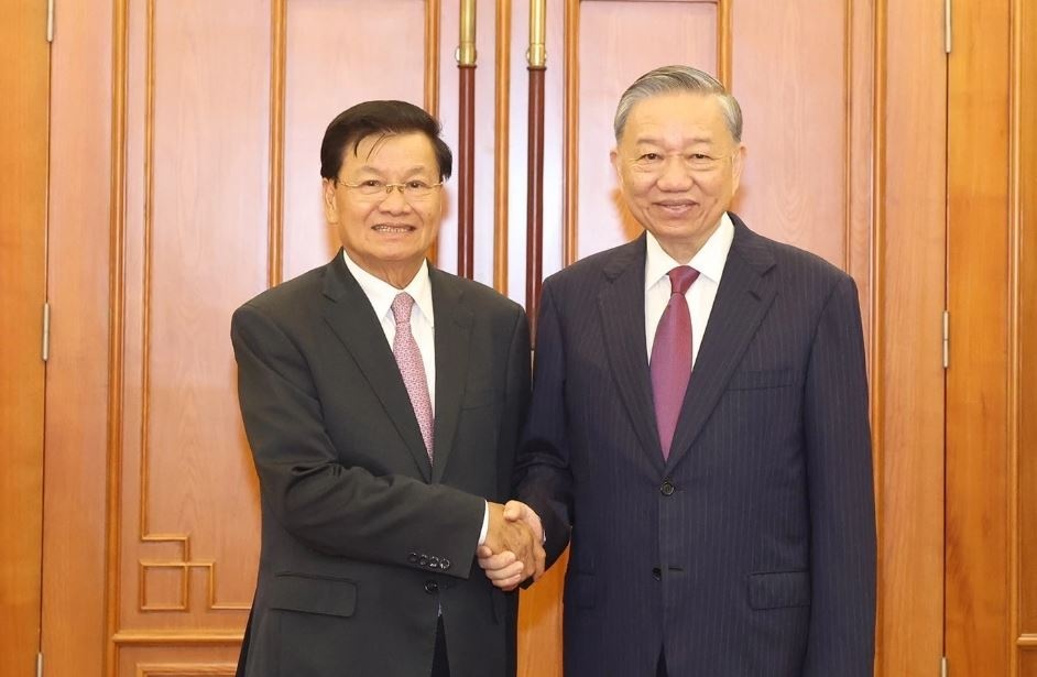 Tong Bi thu, Chu tich nuoc To Lam hoi dam voi Tong Bi thu Lao hinh anh