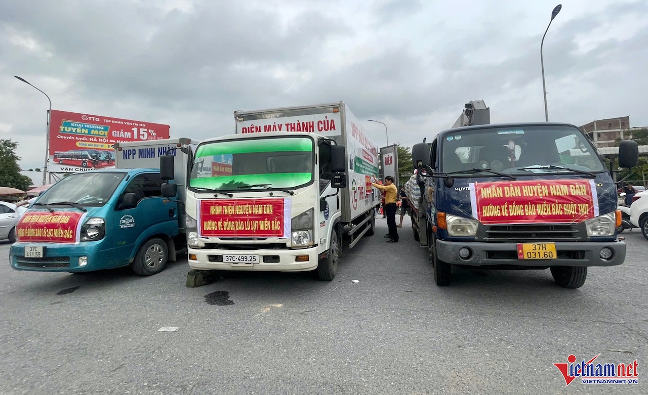 Tu 13/10, dung mien phi cho xe cho hang cuu tro qua tram thu phi hinh anh