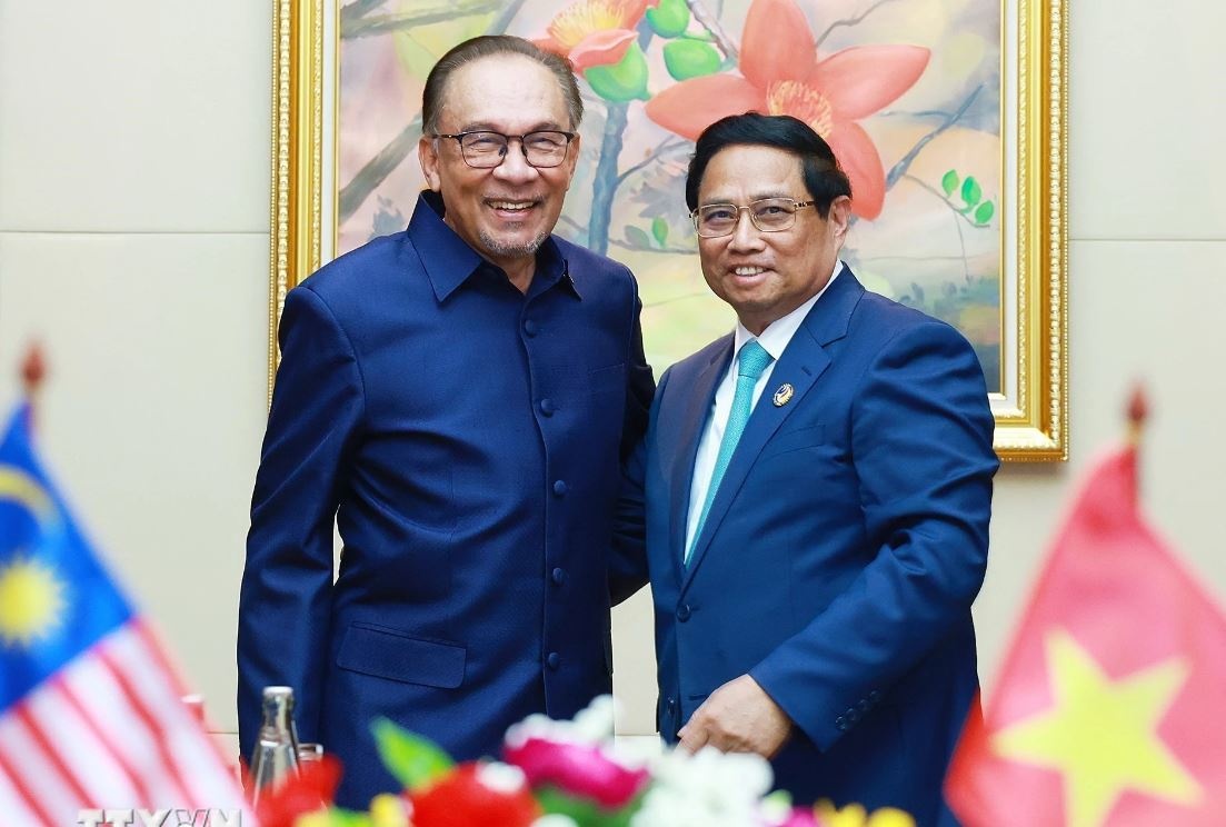 Thu tuong Pham Minh Chinh va Thu tuong Malaysia trao doi hop tac hinh anh