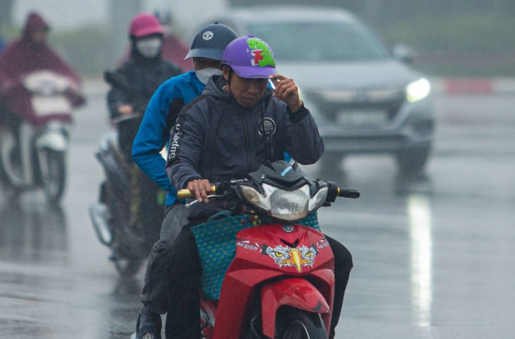 Thoi tiet 15/2: Ha Noi co mua nho, suong mu day dac hinh anh