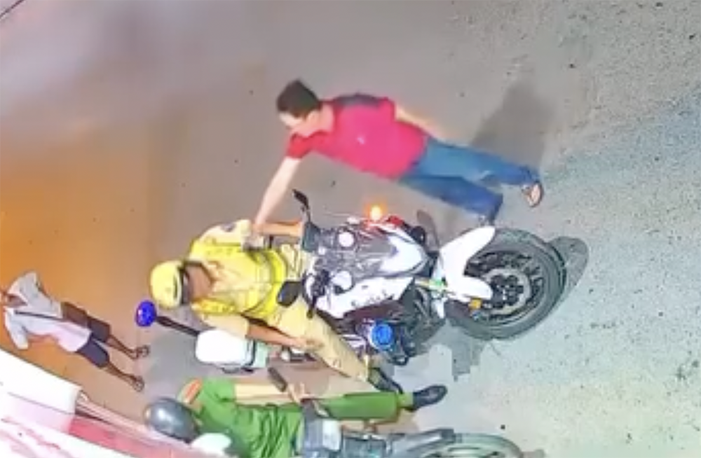 Thong tin ve clip CSGT quat nga nguoi dan ong o TP.HCM hinh anh