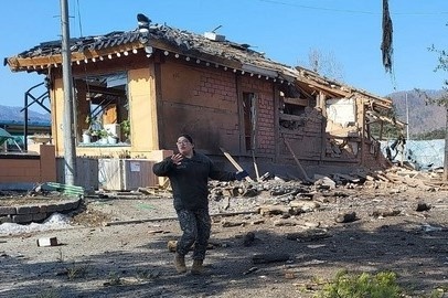 Han Quoc: Dan phao roi xuong nha dan, it nhat 7 nguoi bi thuong hinh anh