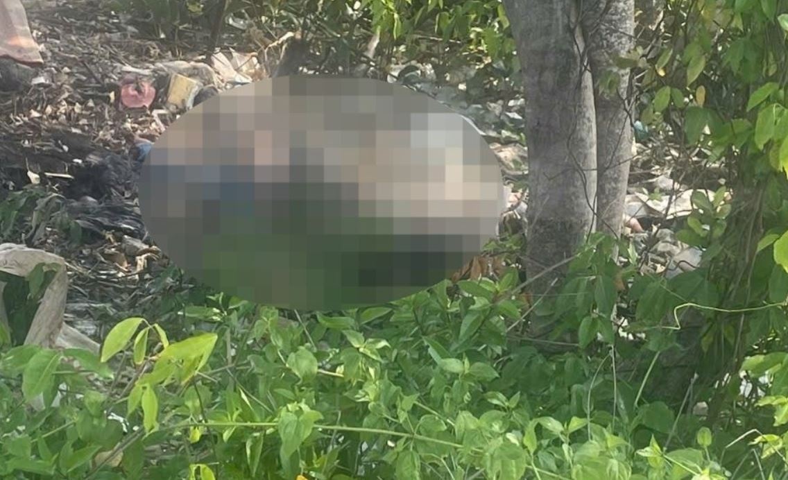 Di tao mo, nguoi dan bang hoang phat hien thi the nam gioi hinh anh