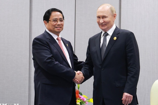 Thu tuong Pham Minh Chinh hoi kien Tong thong Nga Vladimir Putin hinh anh