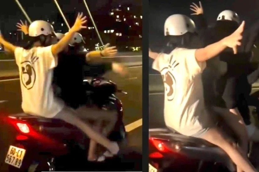 Cuoi SH tha hai tay tren cau Ba Son hinh anh