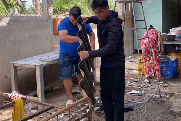 Loc xoay lam hang chuc can nha toc mai, mot nguoi tu vong hinh anh