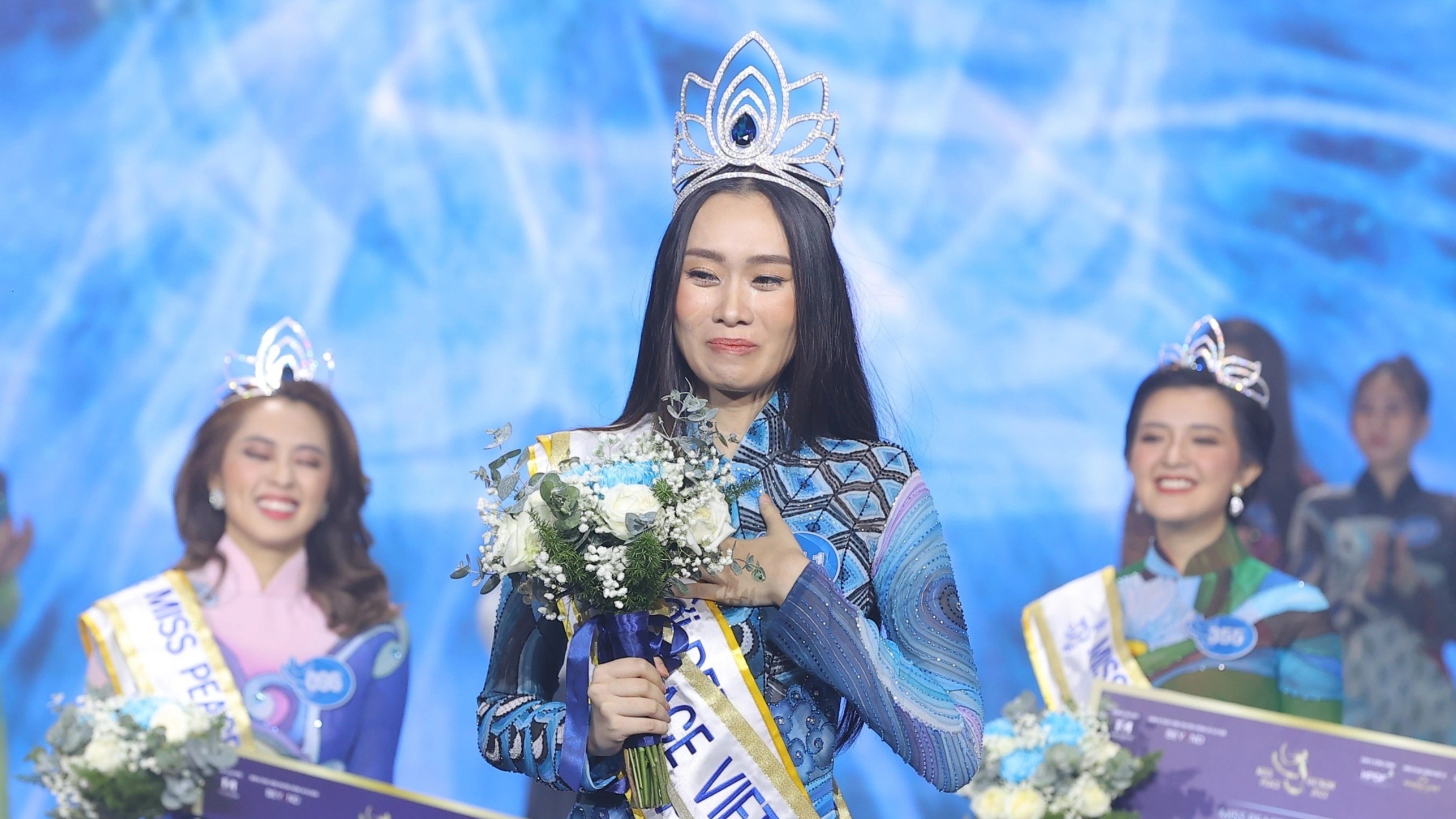 Tran Thi Ban Mai thang Miss Peace Vietnam, khong danh hieu tieng Viet hinh anh