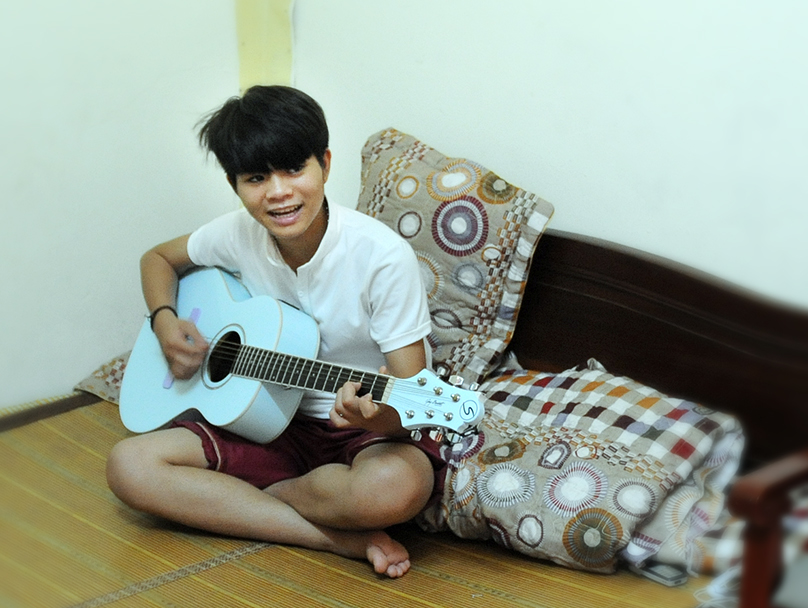 Quang Anh trinh dien ca khuc tu sang tac hinh anh