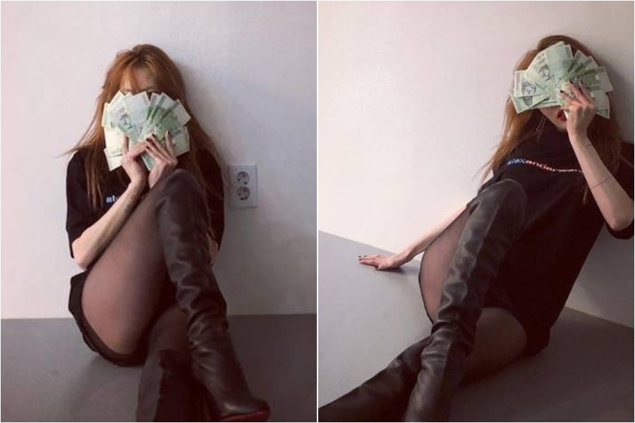 HyunA bi che re tien khi chup anh voi xap tien USD, chi mac quan tat hinh anh