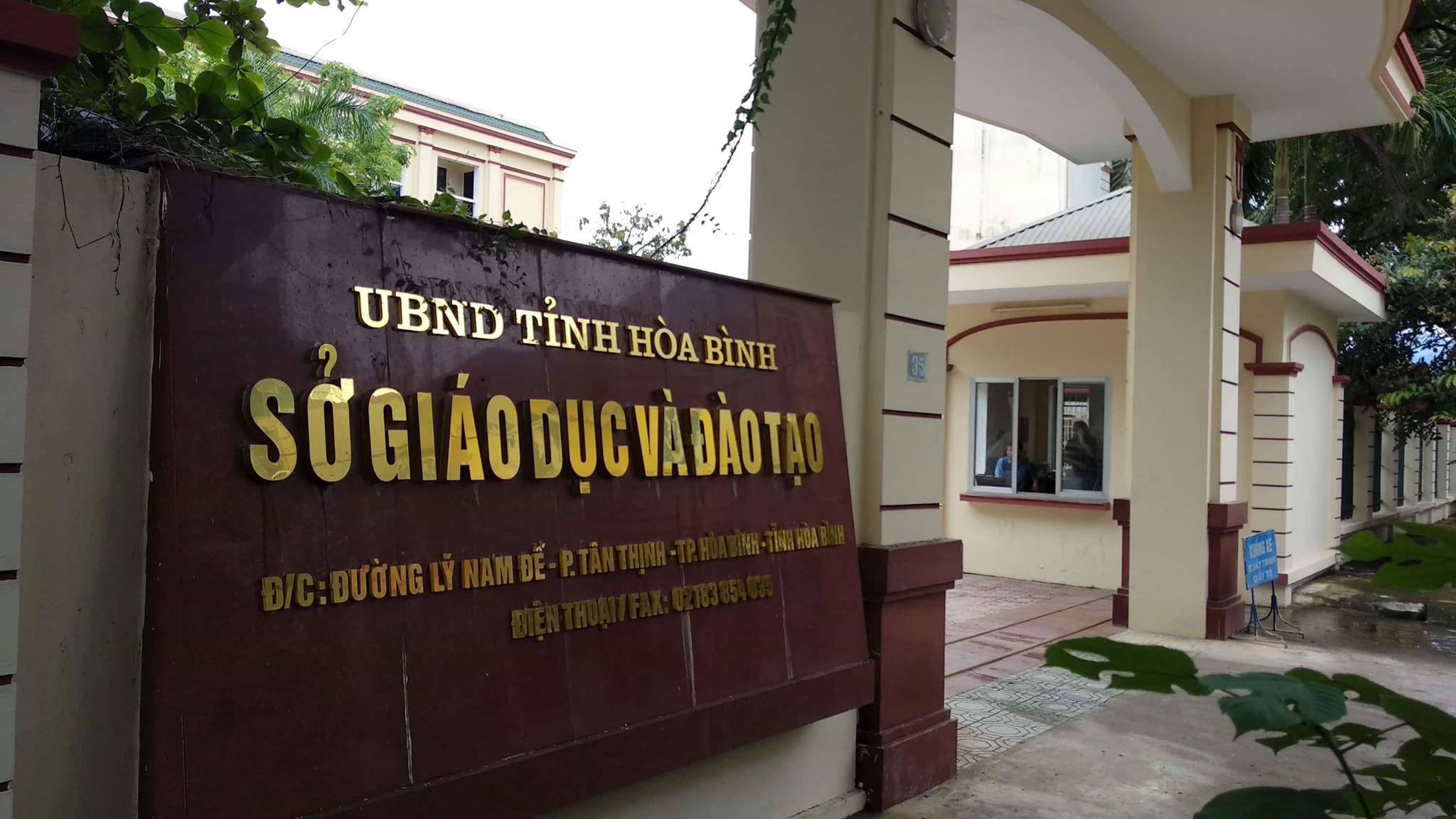 15 can bo o Hoa Binh bi de nghi ky luat vi con duoc nang diem thi hinh anh