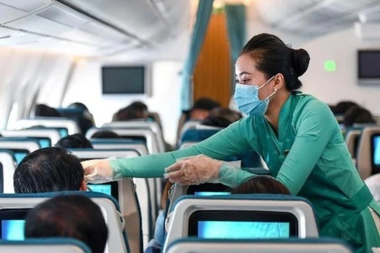 Dam phan lai viec mo duong bay quoc te vi bien chung Omicron hinh anh