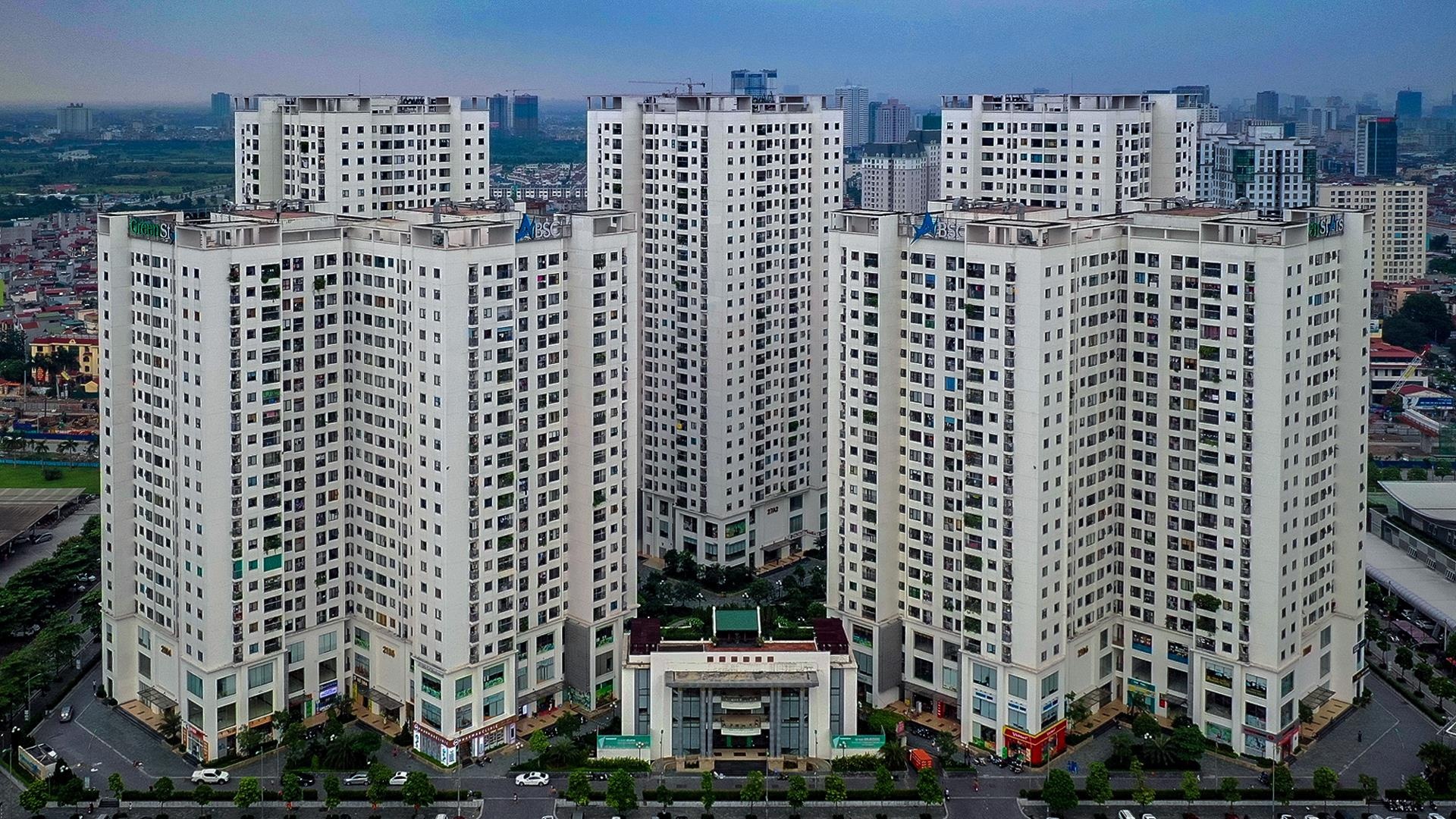 Hy sinh loi ich, danh quy dat thuan loi phat trien nha o xa hoi hinh anh