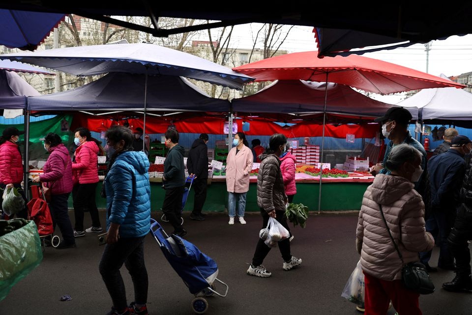 Trung Quoc hoan thoi diem cong bo du lieu kinh te hinh anh