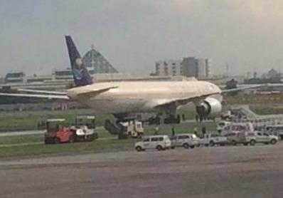 May bay Saudi Arabia bi phong toa o Manila vi nghi khong tac hinh anh