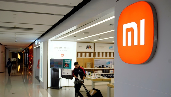 Xiaomi cat giam nhan su hinh anh