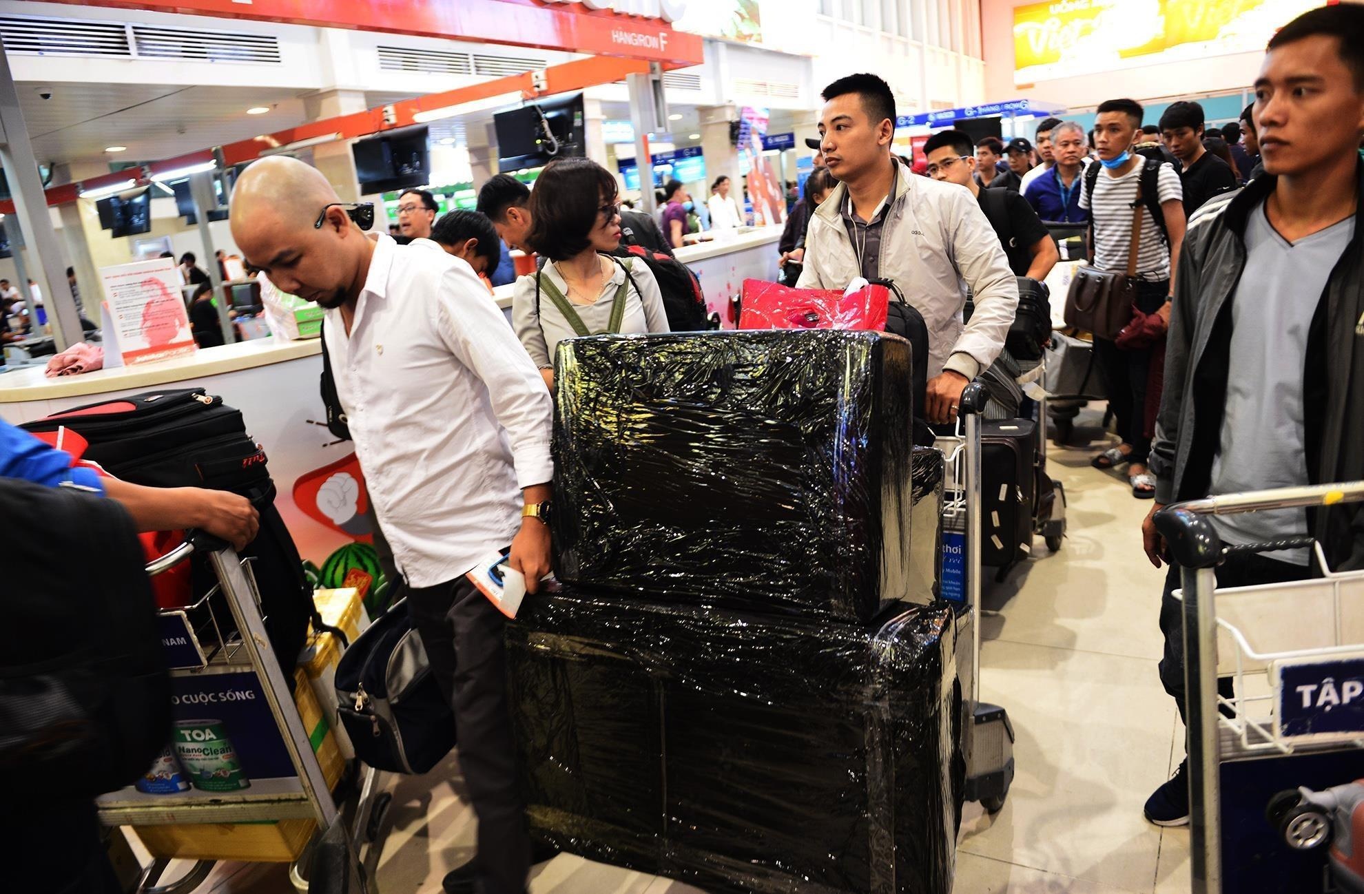 Hanh ly ky gui mien cuoc cua Vietnam Airlines tang giam ra sao sau 1/8 hinh anh