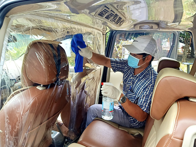 Tai xe taxi cong nghe TP.HCM can tien, mong som duoc hoat dong tro lai hinh anh