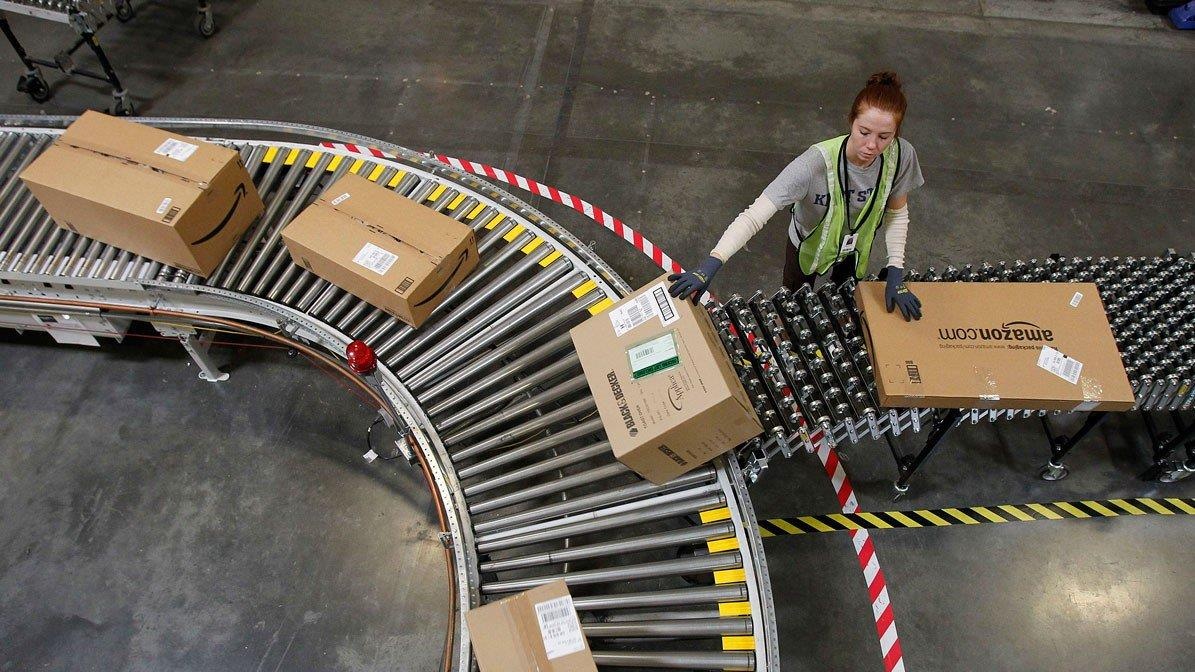 Nhan vien Amazon bi may moc sa thai,  may moc thay the con nguoi anh 1