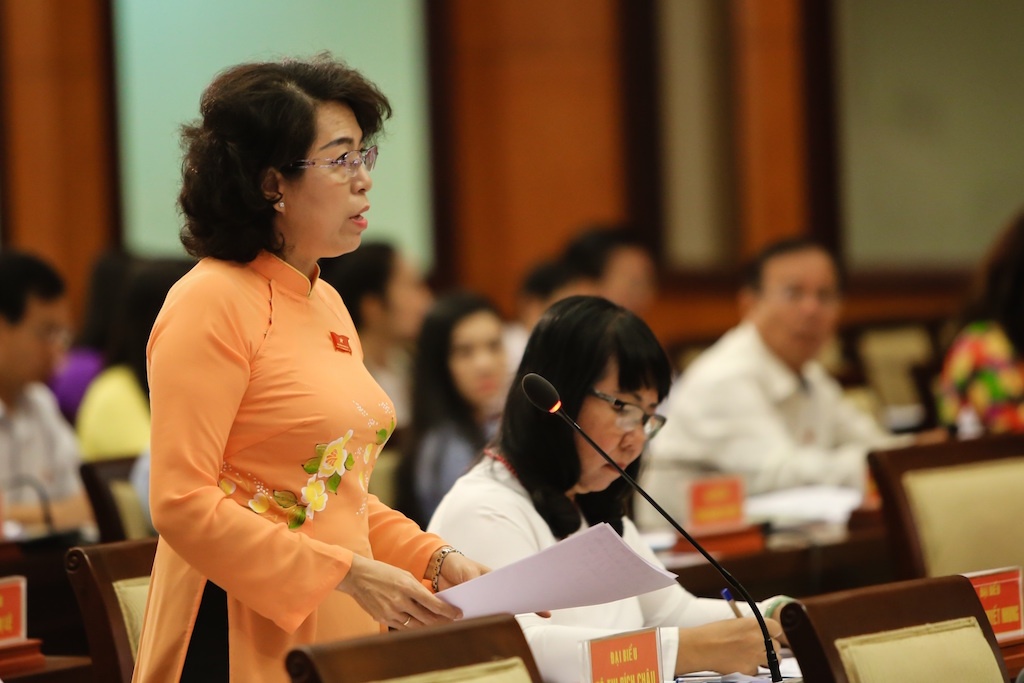 Giam doc So Xay dung tra loi chat van HDND anh 1