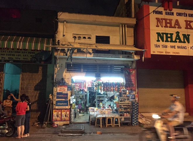 Bat bao ve dan pho sat hai be trai 6 tuoi o Sai Gon hinh anh