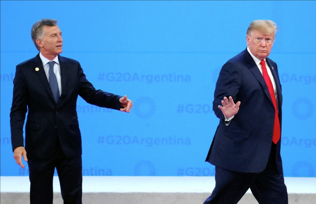 Ong Trump di thang, mac ke tong thong nuoc chu nha G20 ra suc goi hinh anh