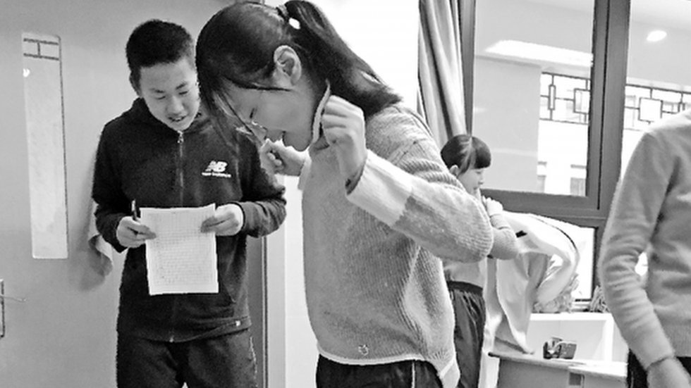 Truong Trung Quoc phat hoc sinh thua can sau Tet anh 1