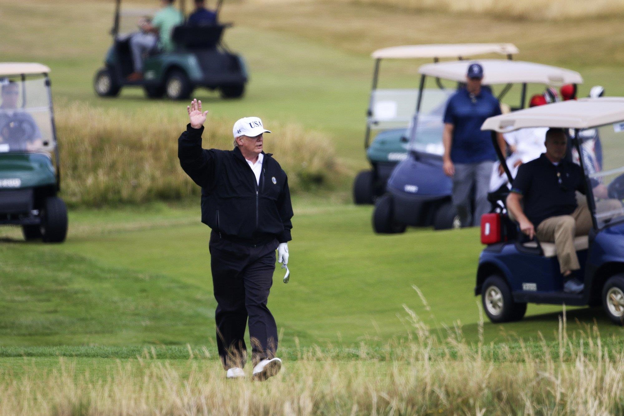 Trump chơi golf ảnh 1 Trump choi golf anh 1