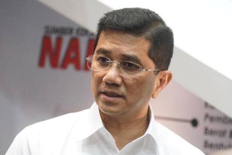 Bo truong Malaysia phu nhan clip sex chan dong hinh anh