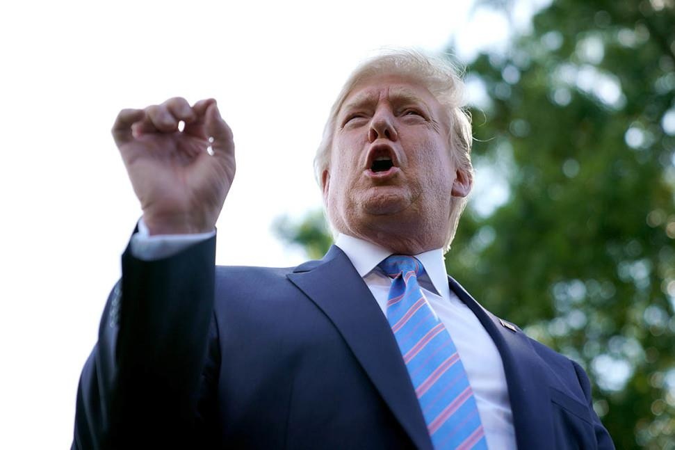 Trump cong kich Obama anh 1