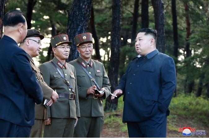 Ong Kim Jong Un thi sat ten lua anh 6