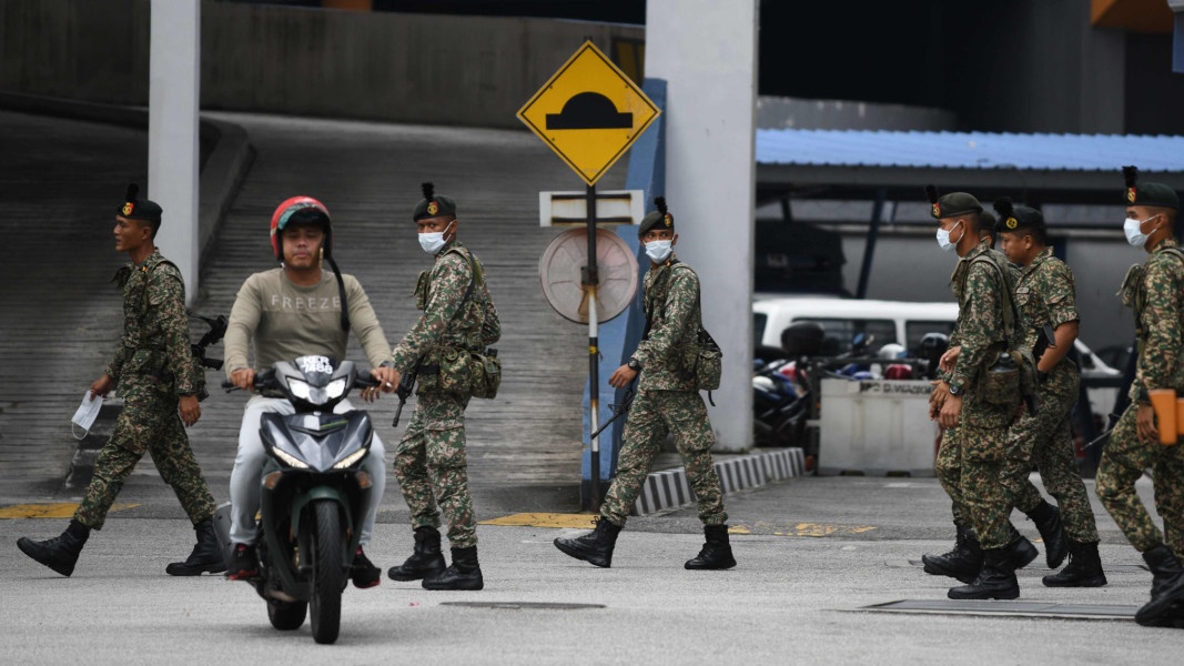 Bo Ngoai giao thong tin ve truong hop cong nhan mac ket tai Malaysia hinh anh