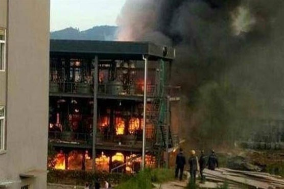 Nha may hoa chat o Trung Quoc boc chay du doi sau vu no hinh anh