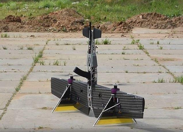 Nga tao ra UAV ‘ac mong bay’ co trang bi shotgun hinh anh