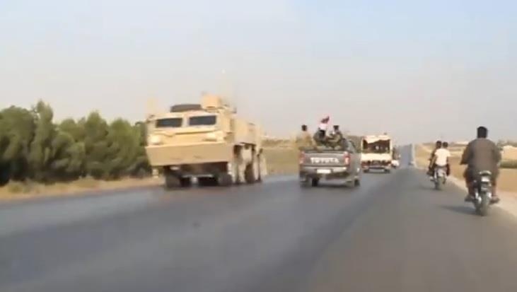 Linh My dang rut khoi thi tran thi gap quan doi Syria tien vao hinh anh