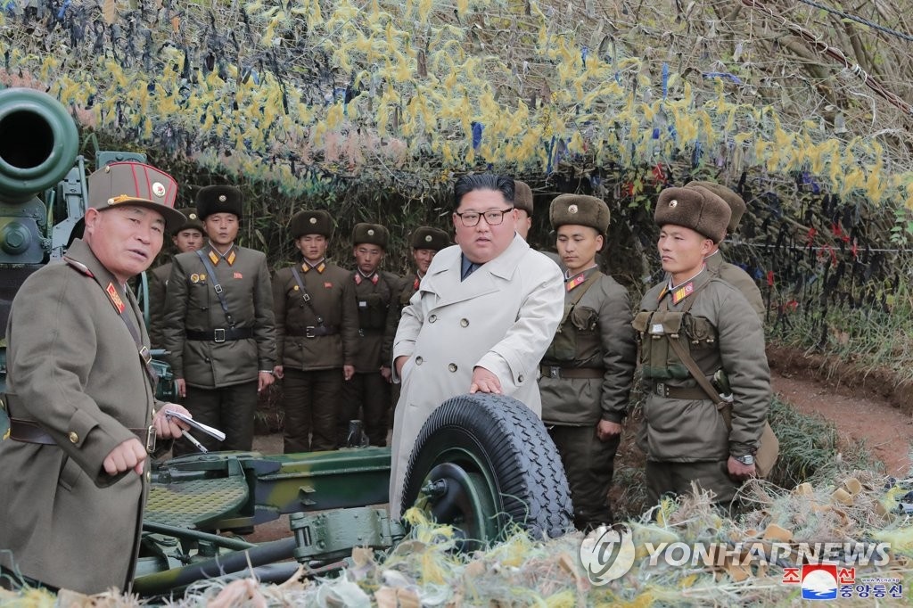 Ong Kim Jong Un thi sat don vi quan doi anh 1