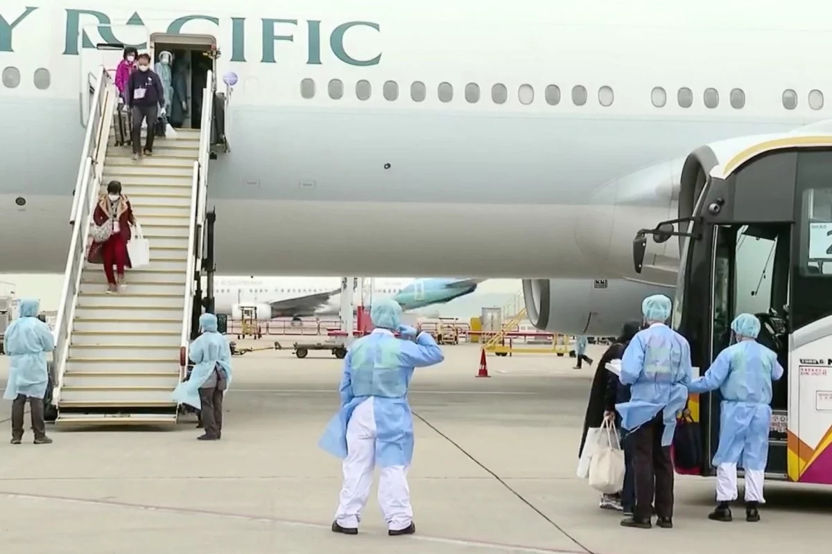 106 nguoi Hong Kong dau tien ve nuoc sau hanh trinh ac mong hinh anh