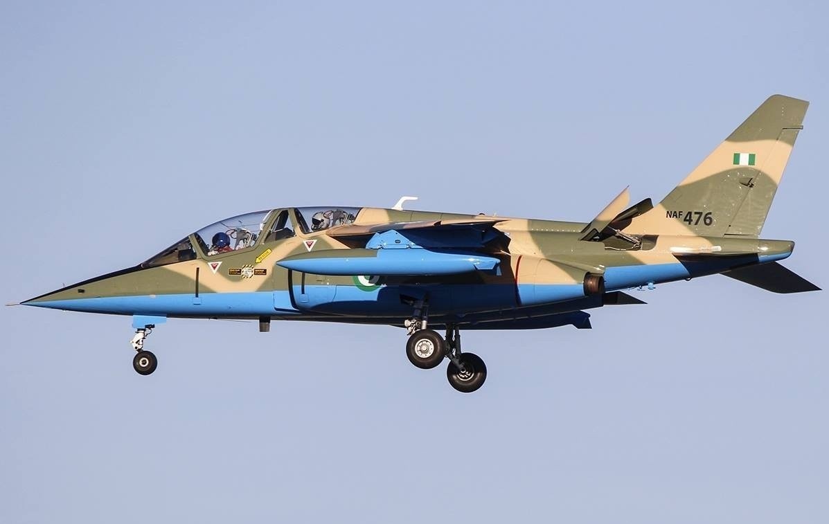 Chien dau co Nigeria bi bang dang ban roi hinh anh